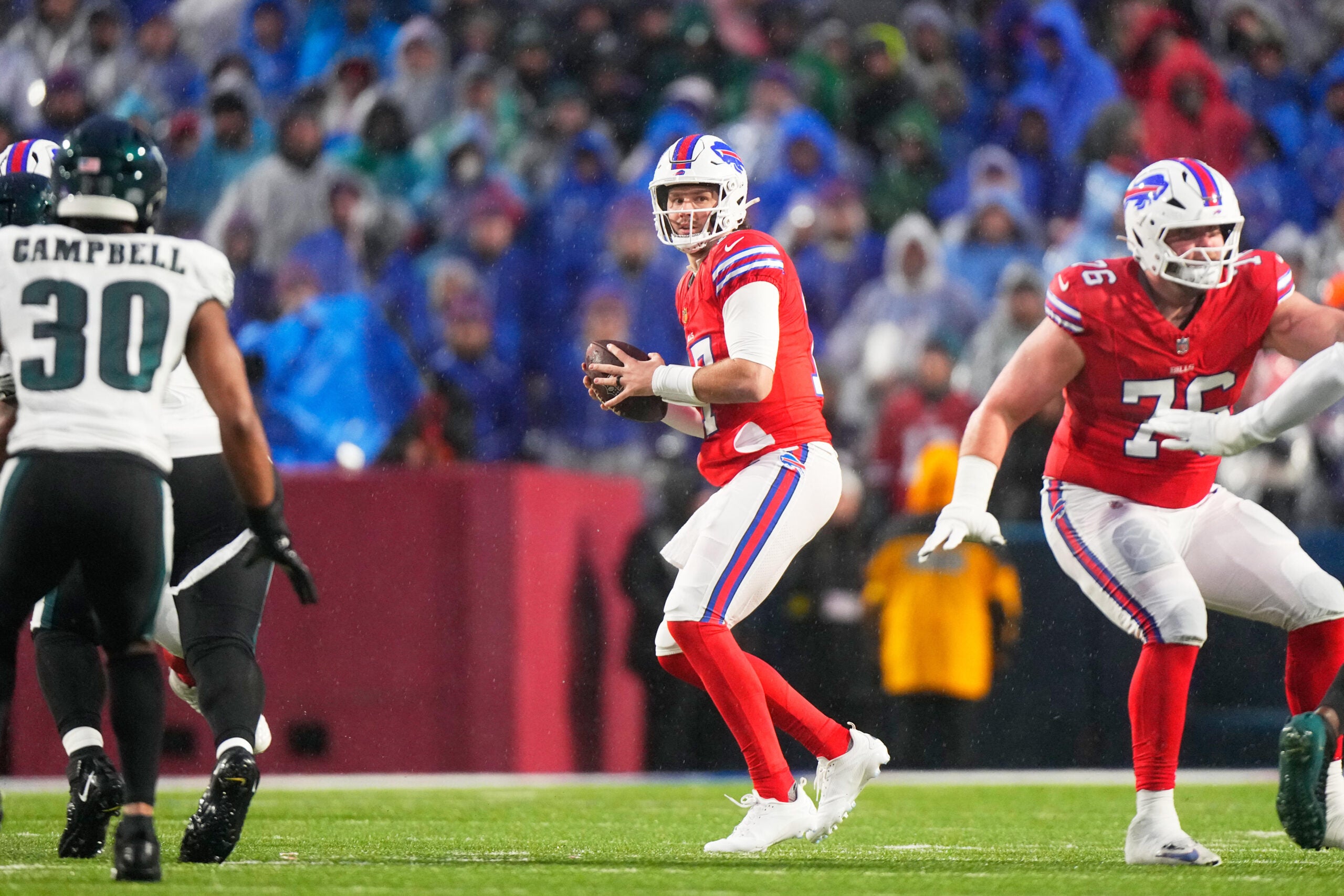 Dec 28, 2025; Orchard Park, New York, USA; Buffalo Bills quarterback Josh Allen (17) looks to throw a pass against the Philadelphia Eagles during the first quarter at Highmark Stadium.