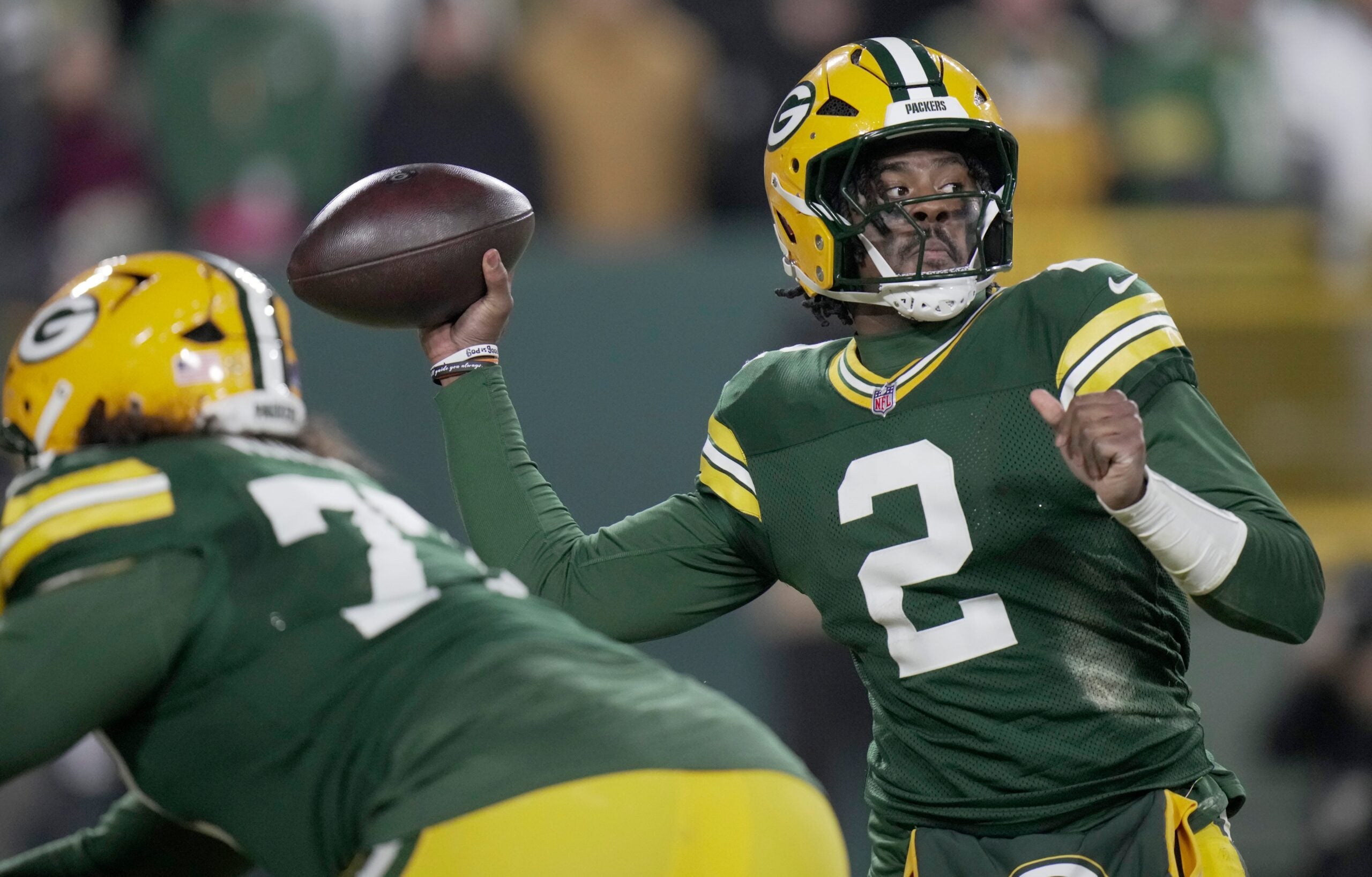 Green Bay Packers quarterback Malik Willis (2) throws during the third quarter of their game against the Baltimore Ravens Saturday, December 27, 2025 at Lambeau Field in Green Bay, Wisconsin.