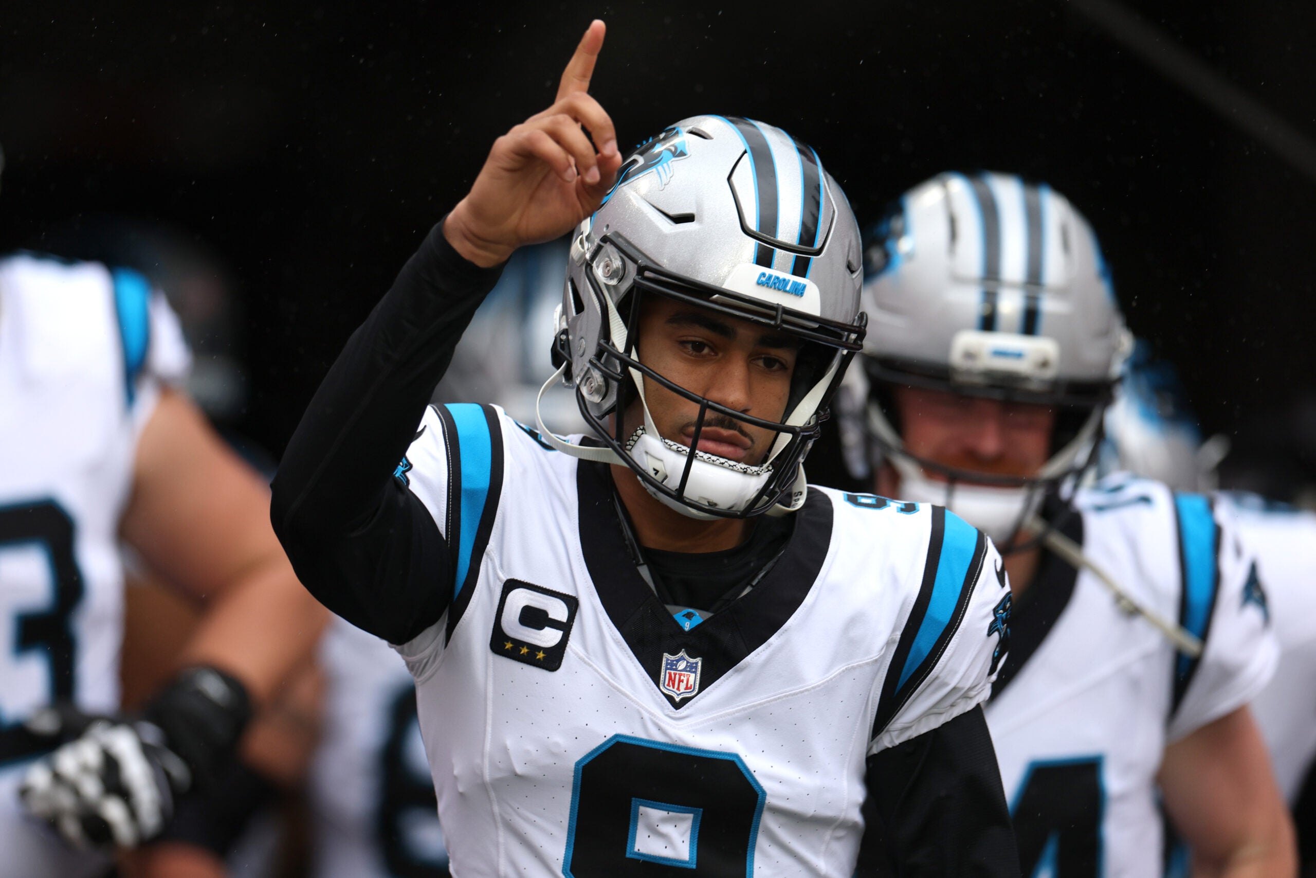 Jan 3, 2026; Tampa, Florida, USA; Carolina Panthers quarterback Bryce Young (9) runs on field before the game against the Tampa Bay Buccaneers at Raymond James Stadium.