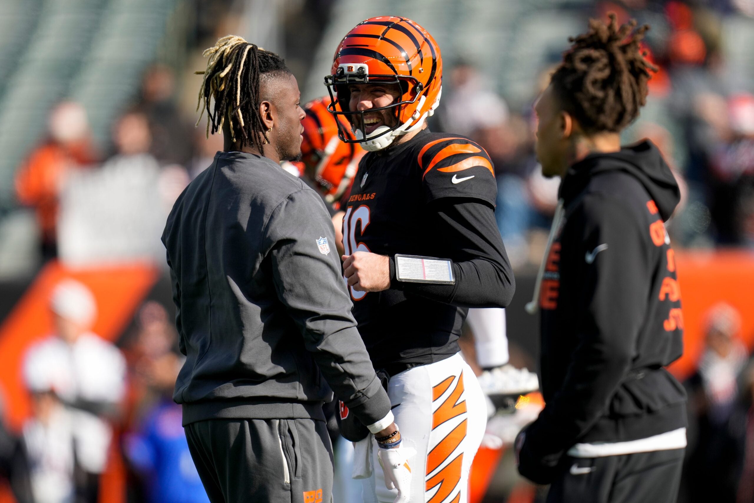Cincinnati Bengals quarterback Joe Flacco (16) catches up with former teammates before the first quarter of the NFL Week 18 game between the Cincinnati Bengals and the Cleveland Browns at Paycor Stadium in Downtown Cincinnati on Sunday, Jan. 4, 2026.
