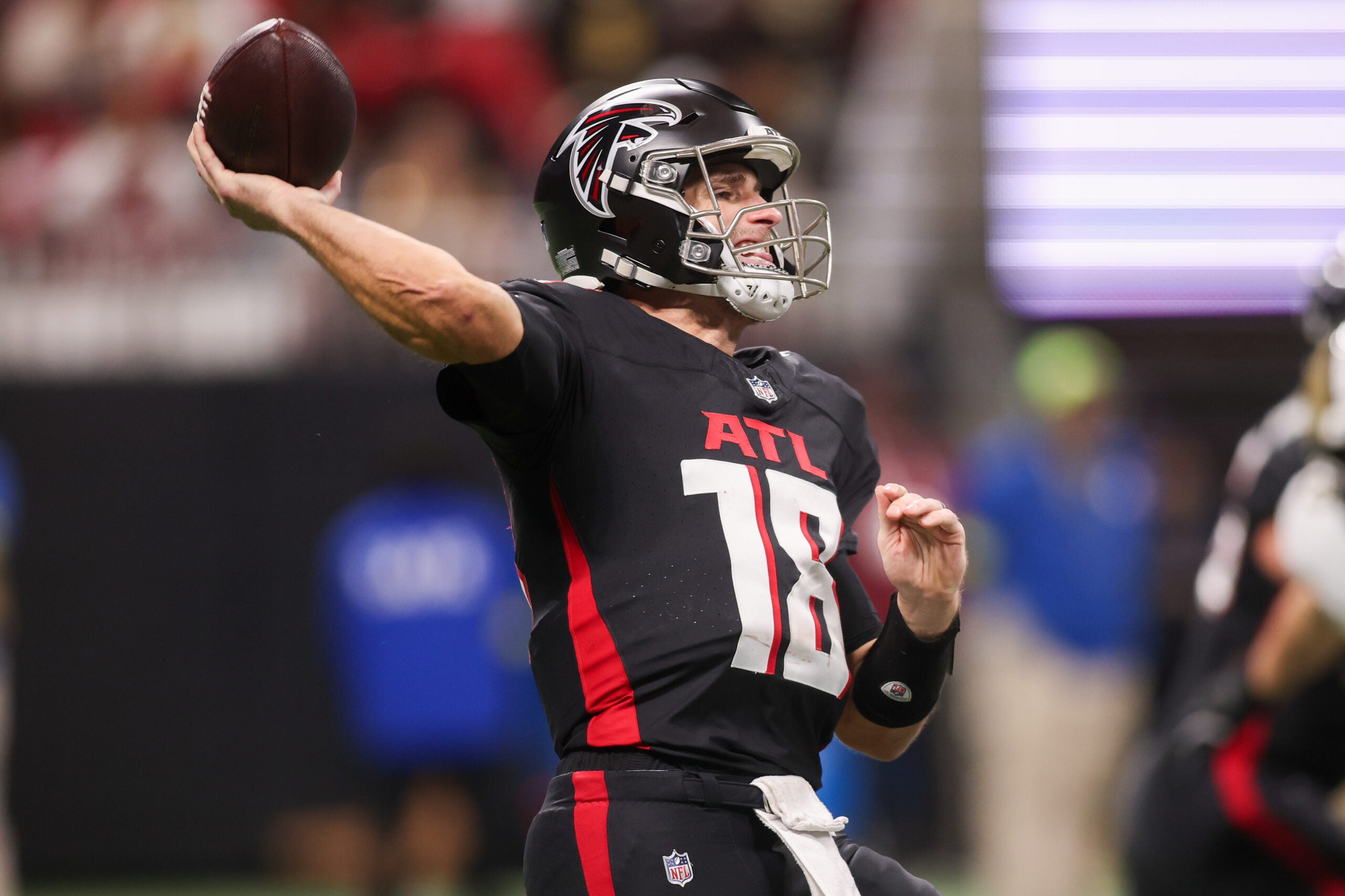 Jan 4, 2026; Atlanta, Georgia, USA; Atlanta Falcons quarterback Kirk Cousins (18) throws a pass against the New Orleans Saints in the first quarter at Mercedes-Benz Stadium.