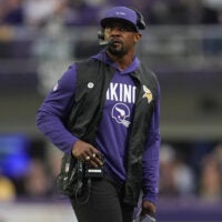Jan 4, 2026; Minneapolis, Minnesota, USA; Minnesota Vikings defensive coordinator Brian Flores looks on against the Green Bay Packers during the fourth quarter at U.S. Bank Stadium.