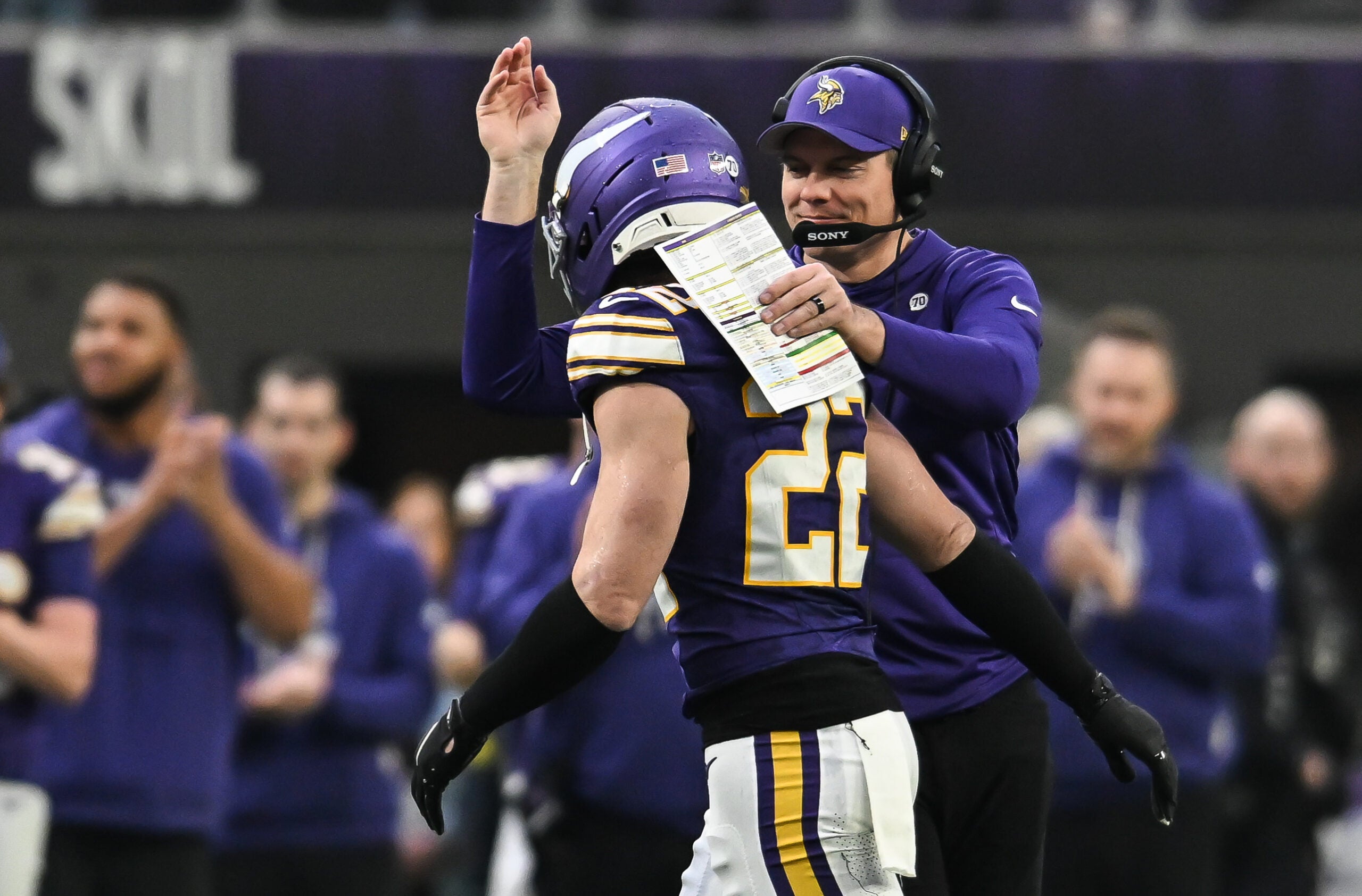 Jan 4, 2026; Minneapolis, Minnesota, USA; Minnesota Vikings head coach Kevin O'Connell greets Minnesota Vikings safety Harrison Smith (22) against the Green Bay Packers during the fourth quarter at U.S. Bank Stadium.