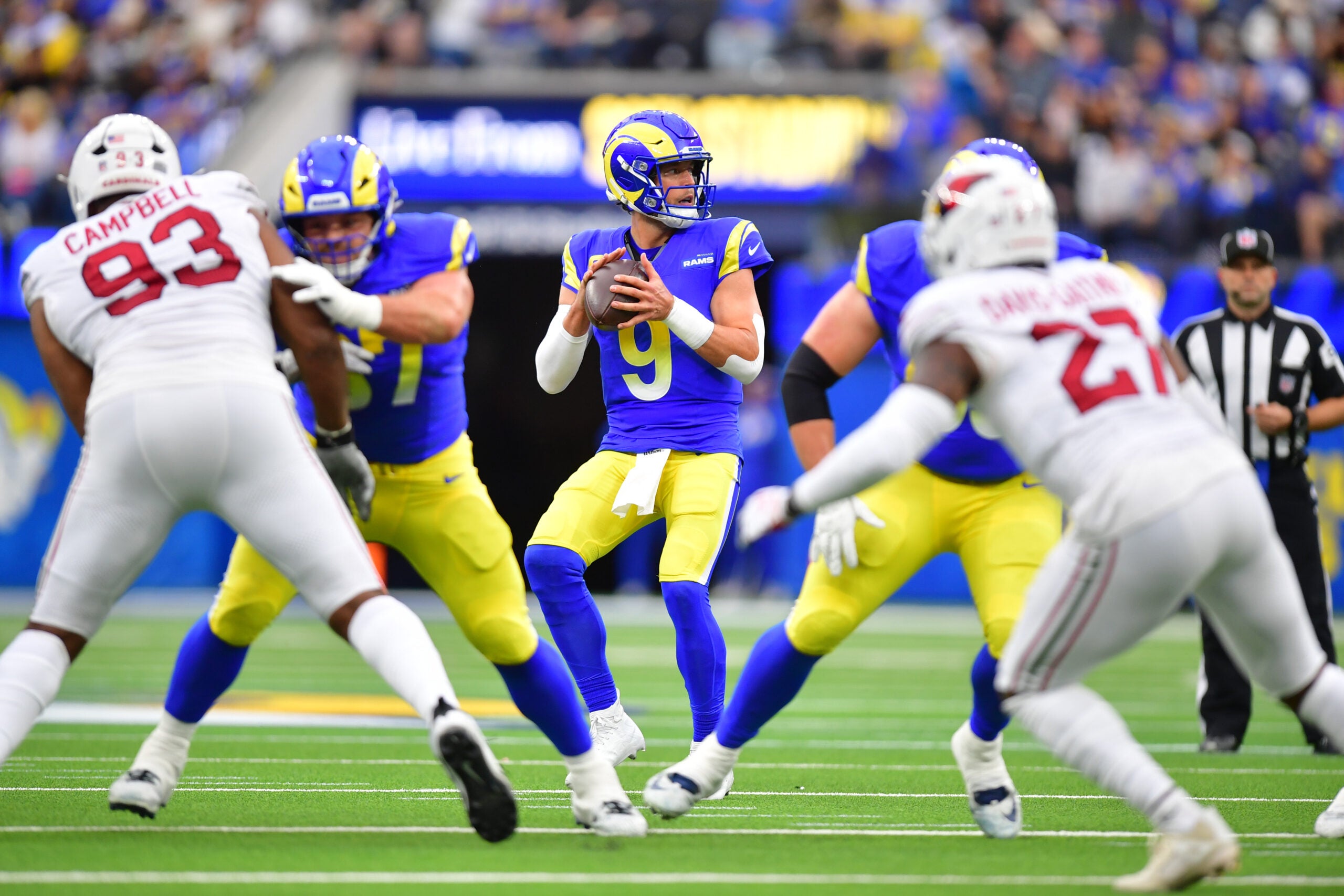 Jan 4, 2026; Inglewood, California, USA; Los Angeles Rams quarterback Matthew Stafford (9) stands in the pocket against the Arizona Cardinals during the first half at SoFi Stadium.