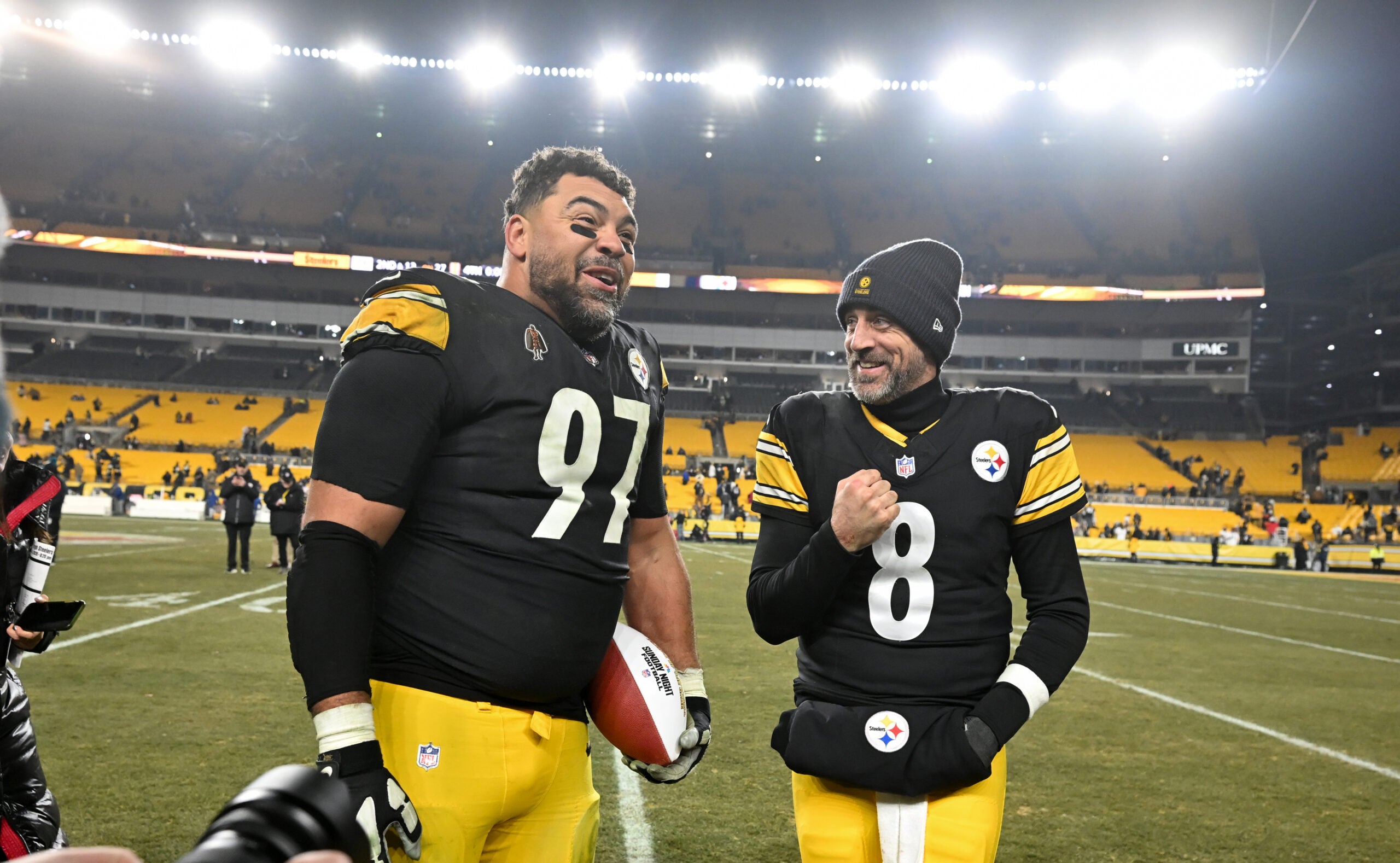 Jan 4, 2026; Pittsburgh, Pennsylvania, USA; Pittsburgh Steelers defensive tackle Cameron Heyward (97) and quarterback Aaron Rodgers (8) celebrate after defeating the Baltimore Ravens at Acrisure Stadium.