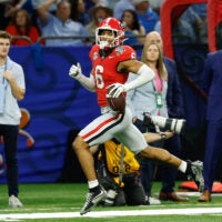 Jan 1, 2026; New Orleans, LA, USA; Georgia Bulldogs defensive back Daylen Everette (6) carries the ball for a touchdown after a fumble recovery against the Mississippi Rebels during the 2026 Sugar Bowl and quarterfinal game of the College Football Playoff at Caesars Superdome.