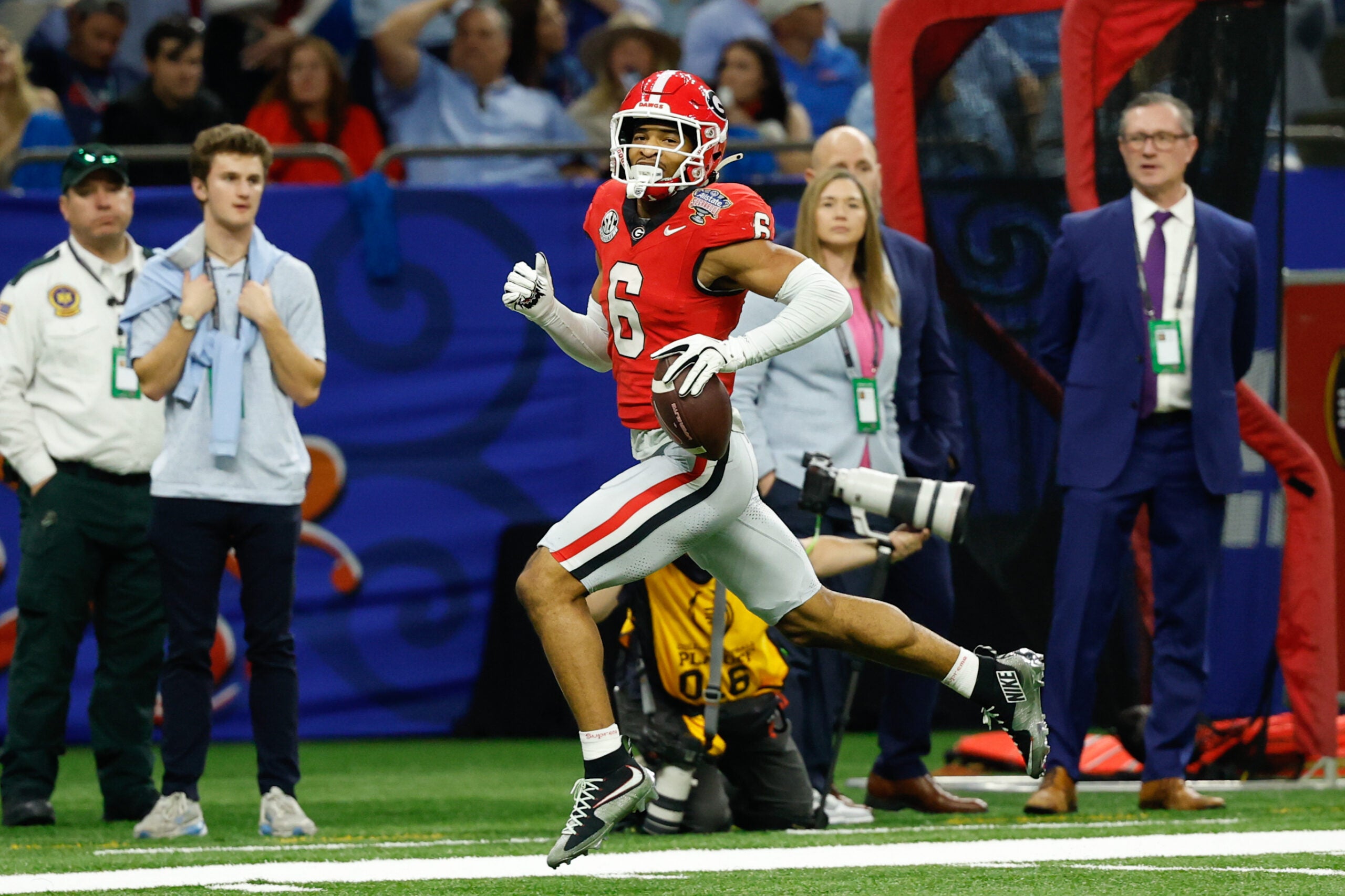 Jan 1, 2026; New Orleans, LA, USA; Georgia Bulldogs defensive back Daylen Everette (6) carries the ball for a touchdown after a fumble recovery against the Mississippi Rebels during the 2026 Sugar Bowl and quarterfinal game of the College Football Playoff at Caesars Superdome.