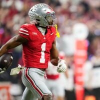 Ohio State Buckeyes cornerback Davison Igbinosun (1) celebrates an interception during the first half of the Big Ten Conference championship game against the Indiana Hoosiers at Lucas Oil Stadium in Indianapolis on Dec. 6, 2025.