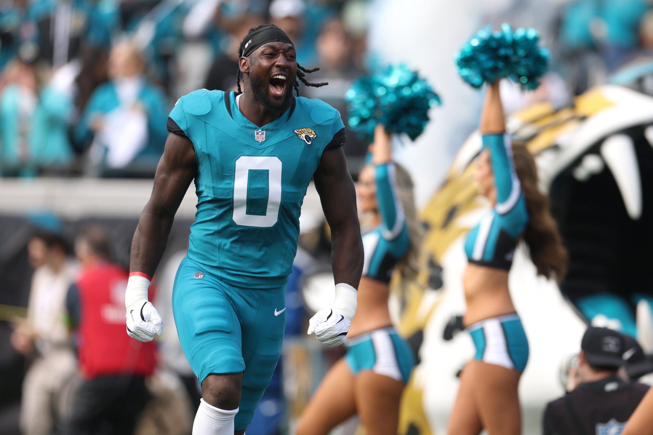 Jan 11, 2026; Jacksonville, FL, USA; Jacksonville Jaguars linebacker Devin Lloyd (0) runs on the field before an AFC Wild Card Round game against the Buffalo Bills at EverBank Stadium.