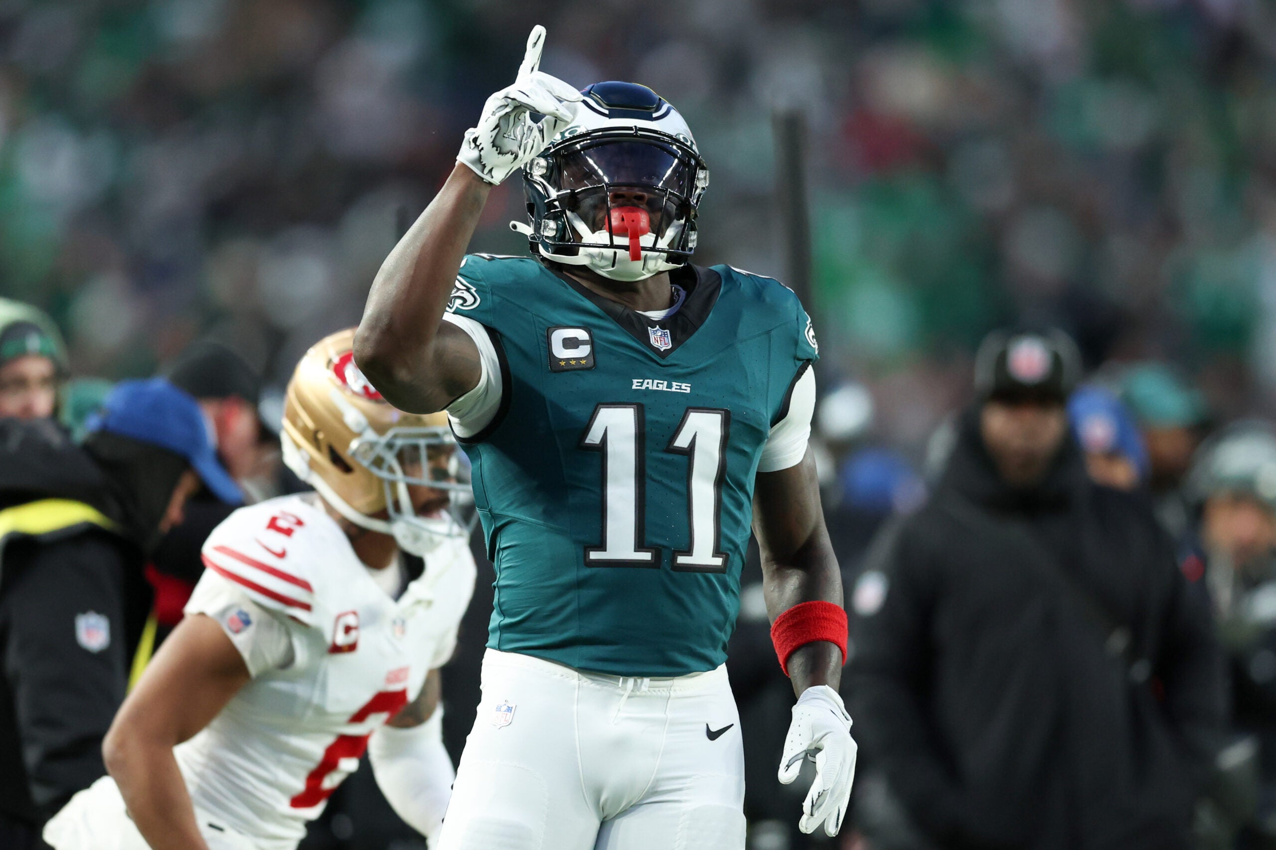 Jan 11, 2026; Philadelphia, PA, USA; Philadelphia Eagles wide receiver A.J. Brown (11) celebrates first down against the San Francisco 49ers during the first quarter in an NFC Wild Card Round game at Lincoln Financial Field.