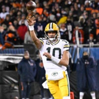 Jan 10, 2026; Chicago, IL, USA; in Green Bay Packers quarterback Jordan Love (10) passes the ball during an NFC Wild Card Round game against the Chicago Bears at Soldier Field.