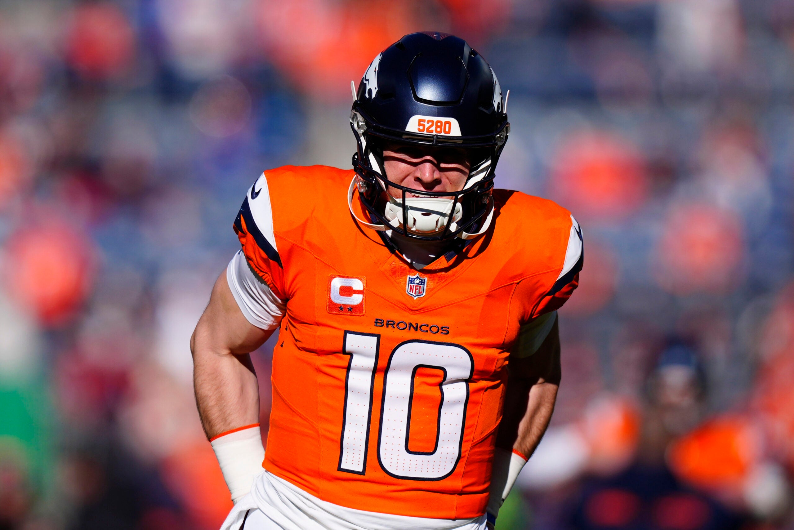 Jan 17, 2026; Denver, CO, USA; Denver Broncos quarterback Bo Nix (10) warms up before an AFC Divisional Round playoff game against the Buffalo Bills at Empower Field at Mile High.