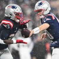 Jan 18, 2026; Foxborough, MA, USA; New England Patriots running back Rhamondre Stevenson (38) receives a hand off in the fourth quarter against the Houston Texans in an AFC Divisional Round game at Gillette Stadium.