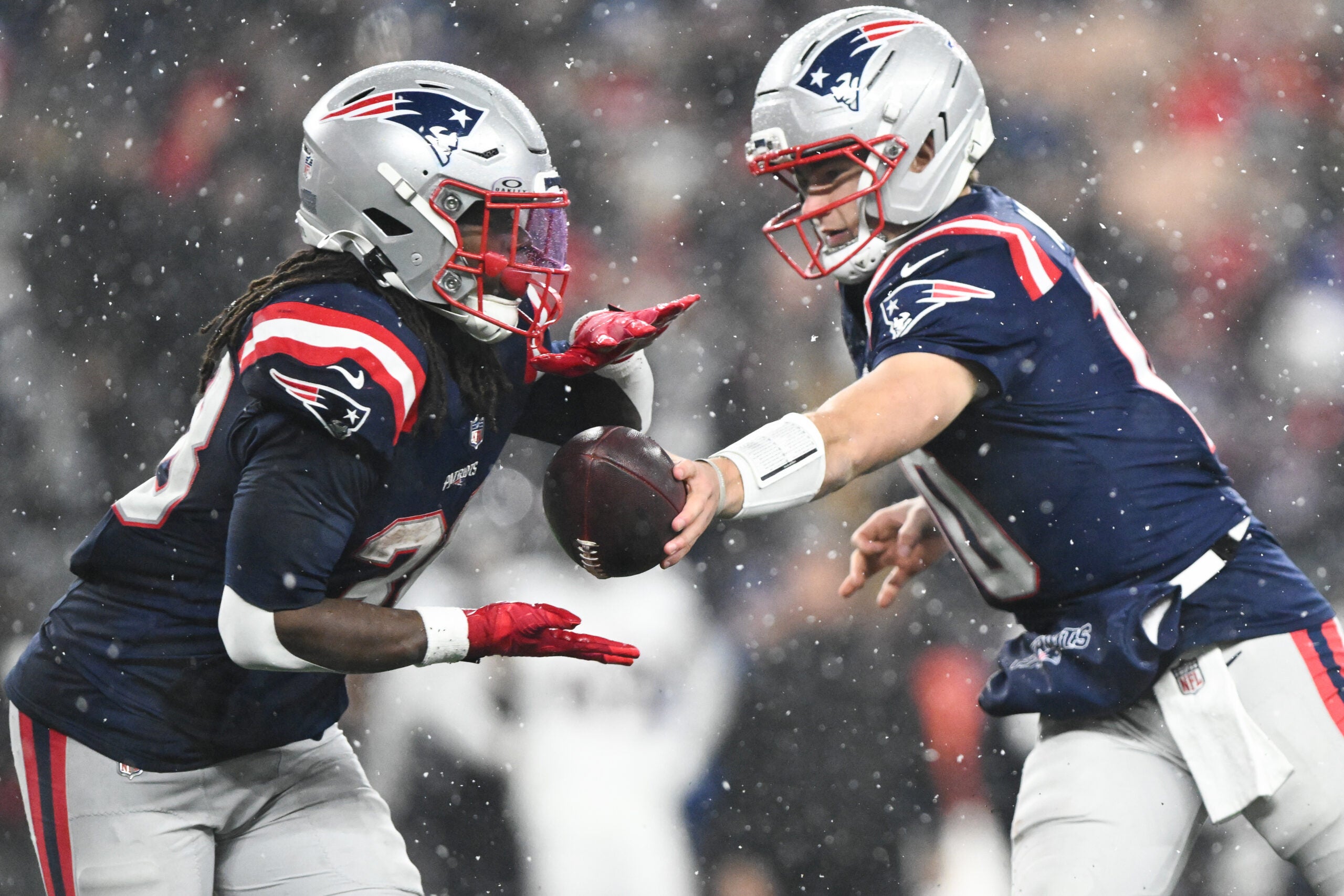 Jan 18, 2026; Foxborough, MA, USA; New England Patriots running back Rhamondre Stevenson (38) receives a hand off in the fourth quarter against the Houston Texans in an AFC Divisional Round game at Gillette Stadium.