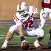 Jan 31, 2026; Mobile, AL, USA; American offensive lineman James Brockermeyer (72) of Miami signals during the first half of the 2026 Senior Bowl at University of South Alabama, Hancock Whitney Stadium.
