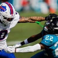 Jacksonville Jaguars cornerback Jarrian Jones (22) denies a touchdown by Buffalo Bills wide receiver Keon Coleman (0) during the second quarter in an NFL football AFC Wild Card playoff matchup, Sunday, Jan. 11, 2026, in Jacksonville, Fla. Bills lead 10-7 at the half over the Jaguars.