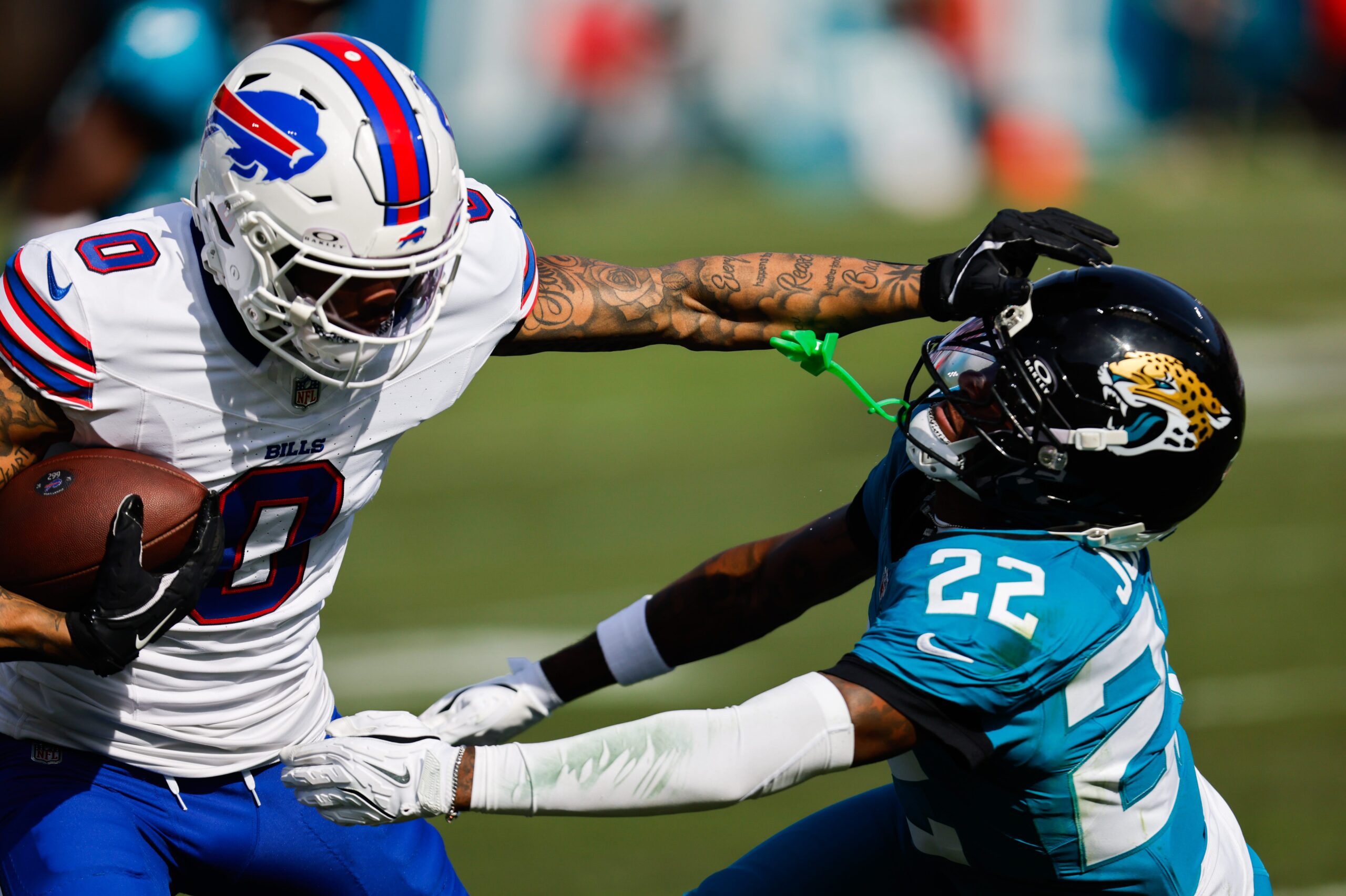Jacksonville Jaguars cornerback Jarrian Jones (22) denies a touchdown by Buffalo Bills wide receiver Keon Coleman (0) during the second quarter in an NFL football AFC Wild Card playoff matchup, Sunday, Jan. 11, 2026, in Jacksonville, Fla. Bills lead 10-7 at the half over the Jaguars.