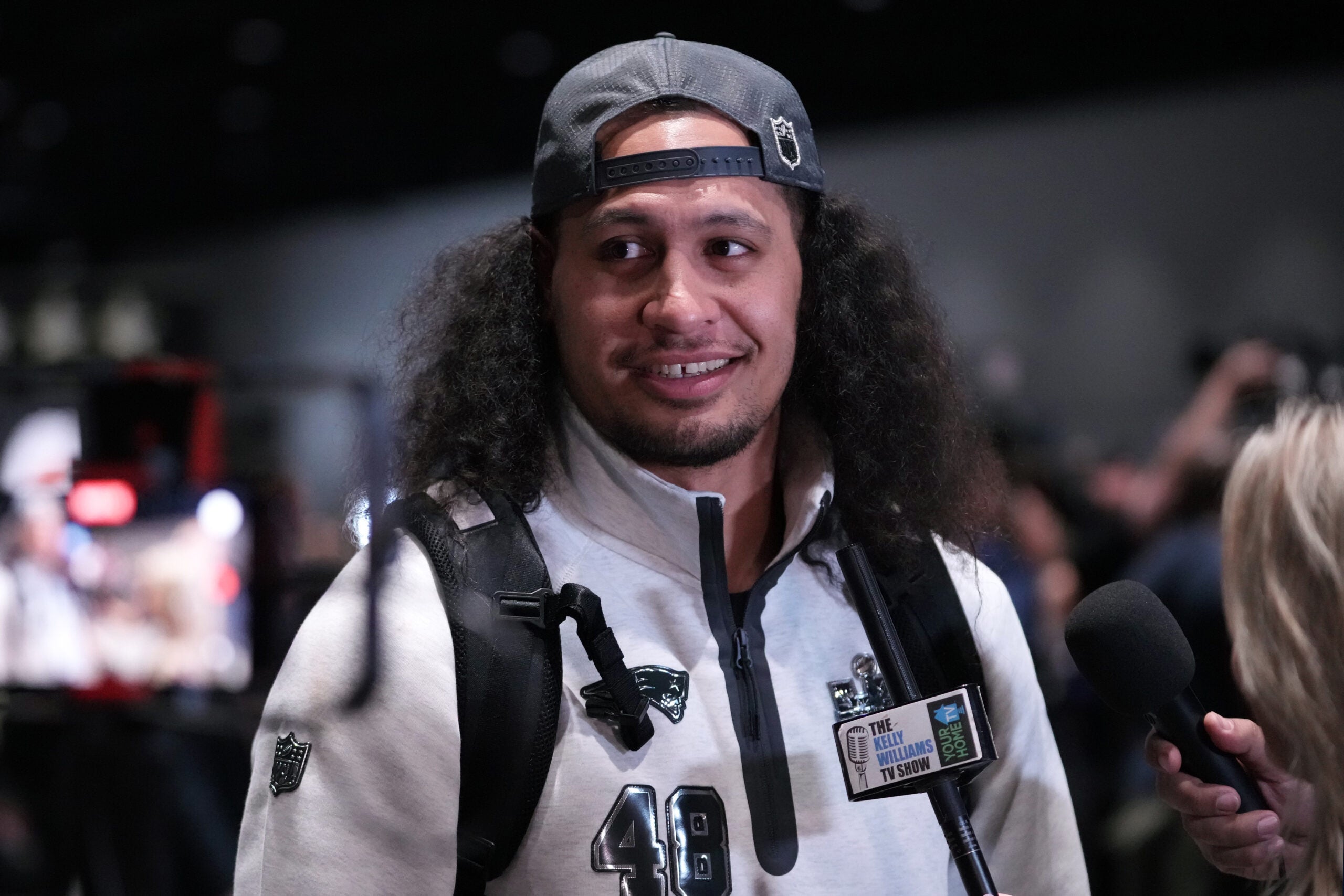 Feb 2, 2026; San Jose, CA, USA; New England Patriots linebacker Jahlani Tavai (48) speaks to media during Opening Night for Super Bowl LX at San Jose Convention Center.