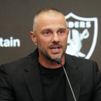 Las Vegas Raiders general manager John Spytek sign Spencer Burford.