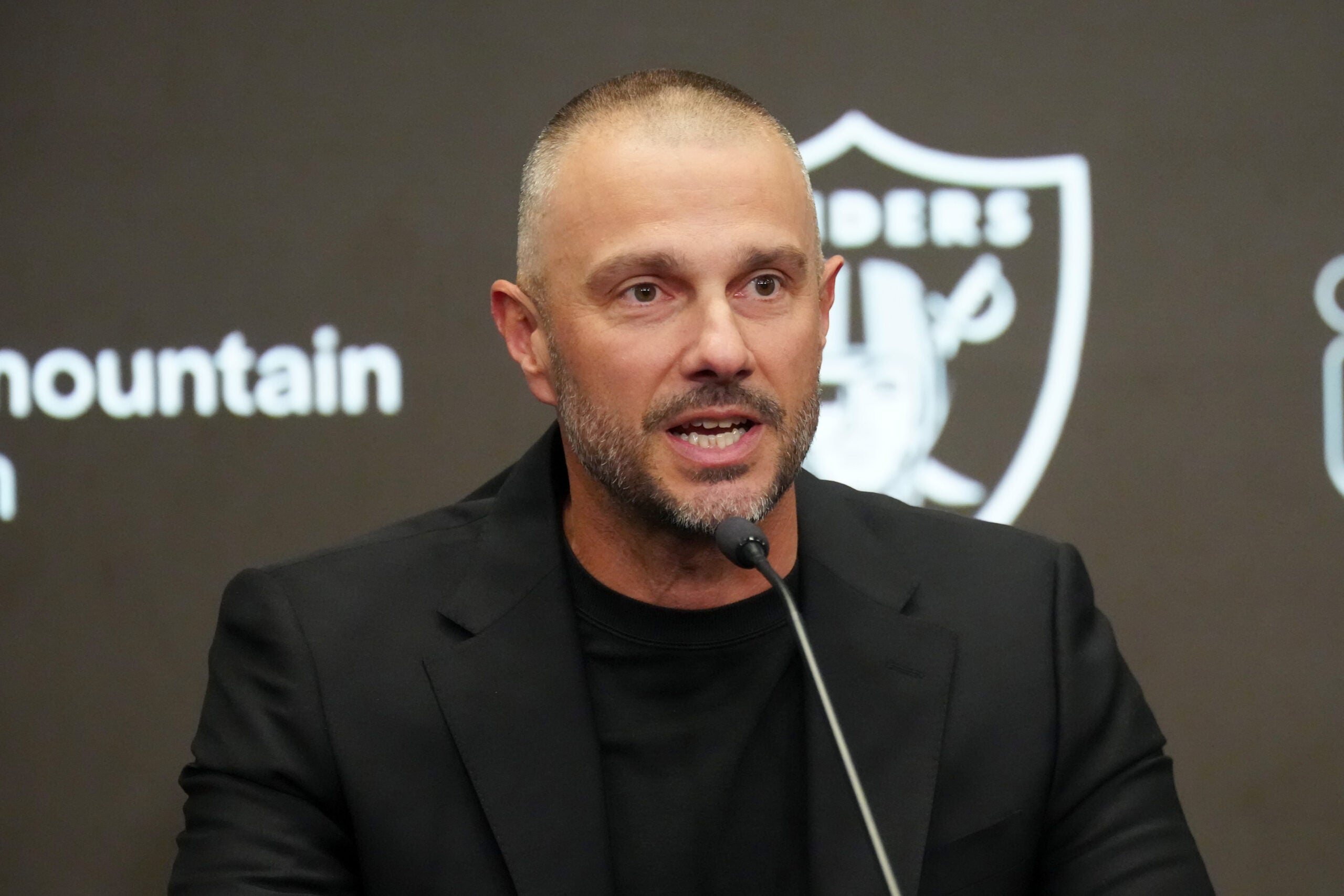 Las Vegas Raiders general manager John Spytek sign Spencer Burford.