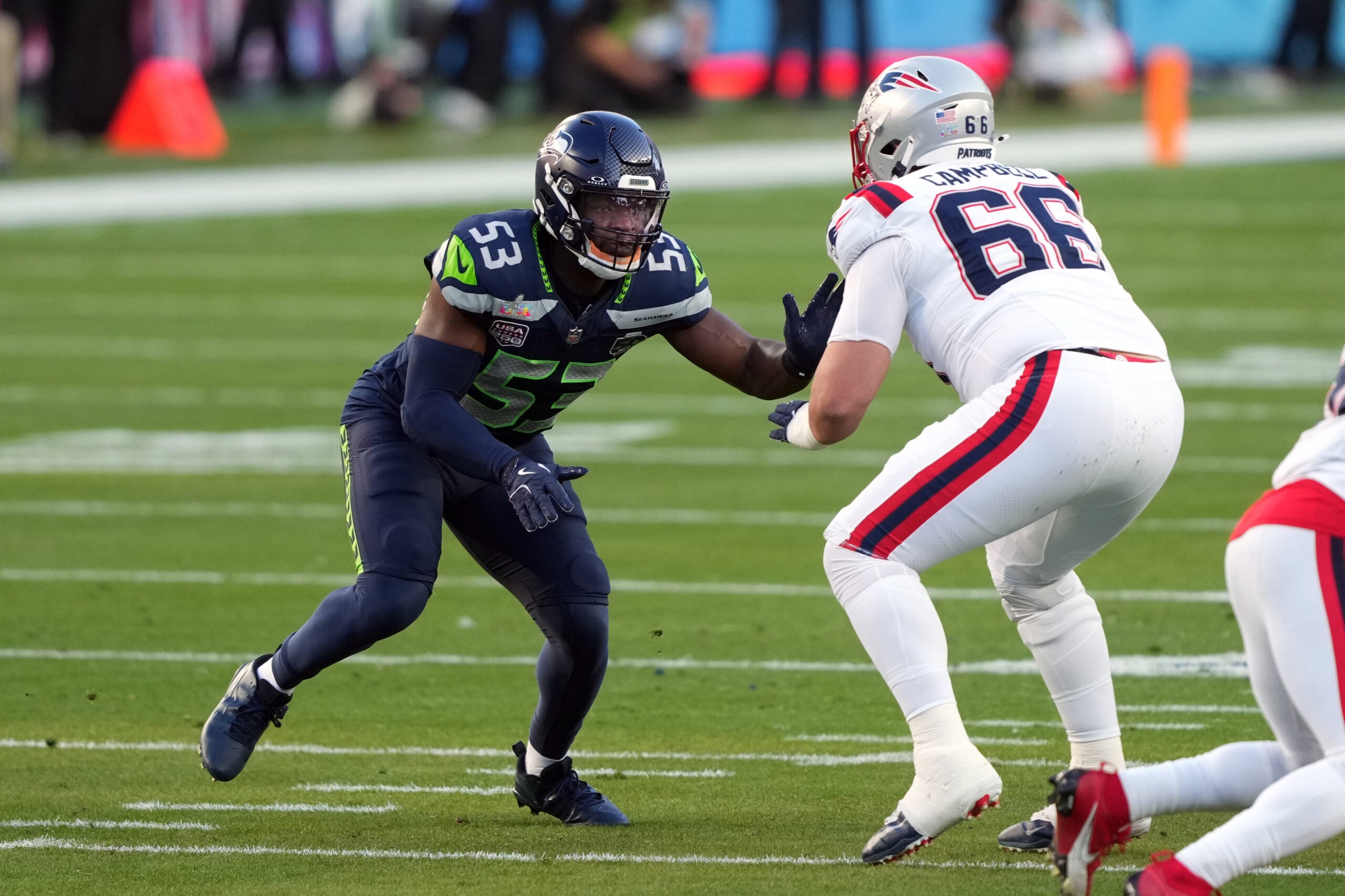 Feb 8, 2026; Santa Clara, CA, USA; Seattle Seahawks linebacker Boye Mafe (53) rushes against New England Patriots offensive tackle Will Campbell (66) during the second quarter in Super Bowl LX at Levi's Stadium.