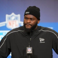 Feb 25, 2026; Indianapolis, IN, USA; Florida defensive lineman Caleb Banks (DL02) speaks during the NFL Scouting Combine at the Indiana Convention Center.