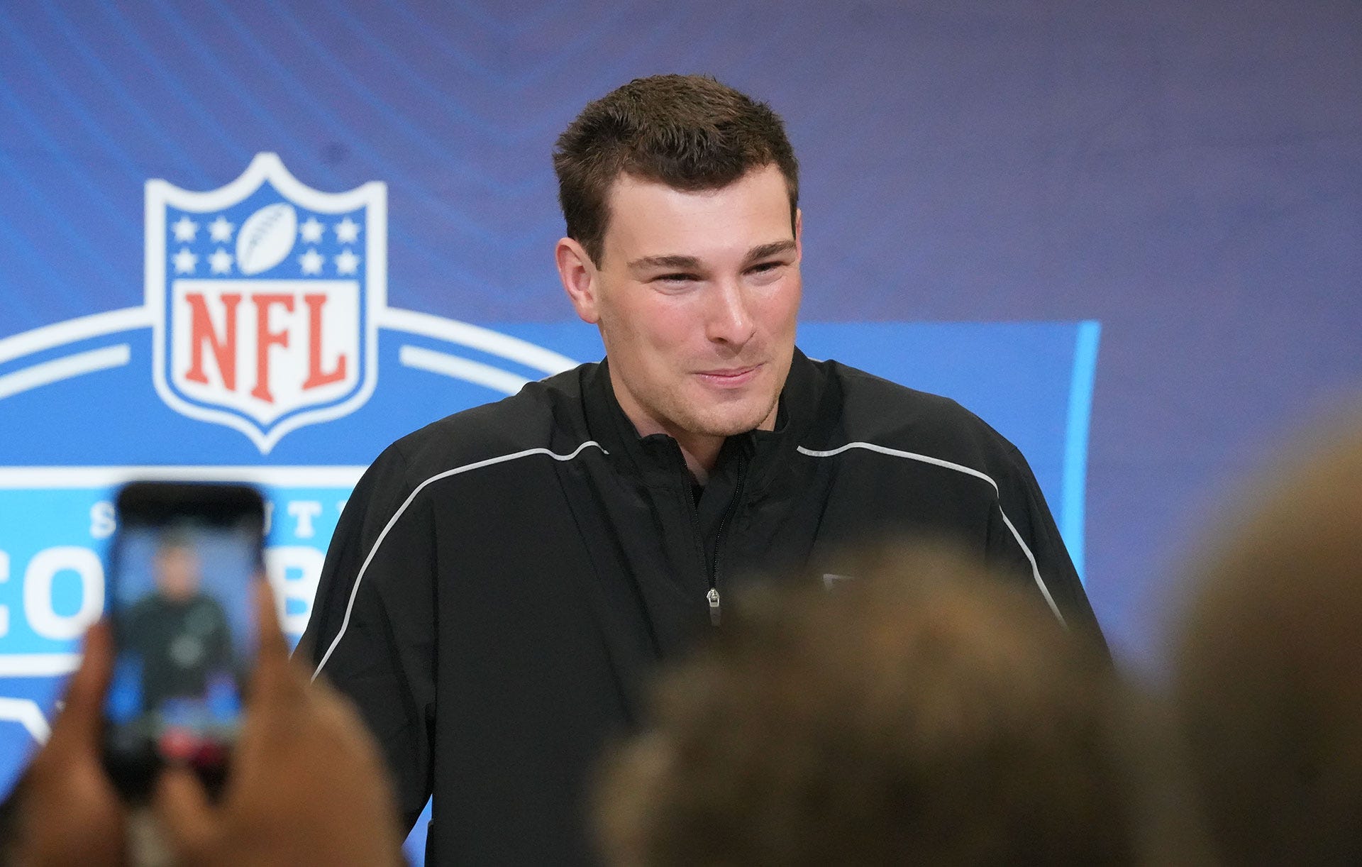 Las Vegas Raiders quarterback Fernando Mendoza starting quarterback Geno Smith.