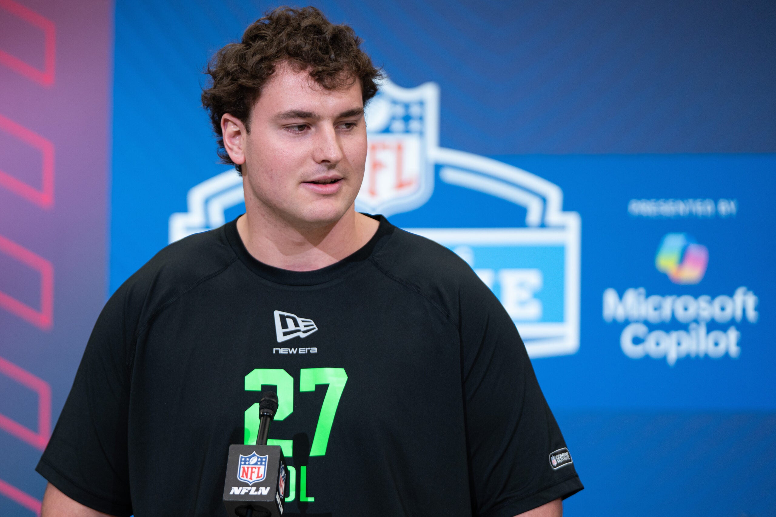 Feb 28, 2026; Indianapolis, IN, USA; Kansas State offensive lineman Sam Hecht (OL27) speaks to members of the media during the NFL Combine at the Indiana Convention Center.