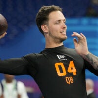 Feb 28, 2026; Indianapolis, IN, USA; Miami quarterback Carson Beck (QB04) during the NFL Scouting Combine at Lucas Oil Stadium.