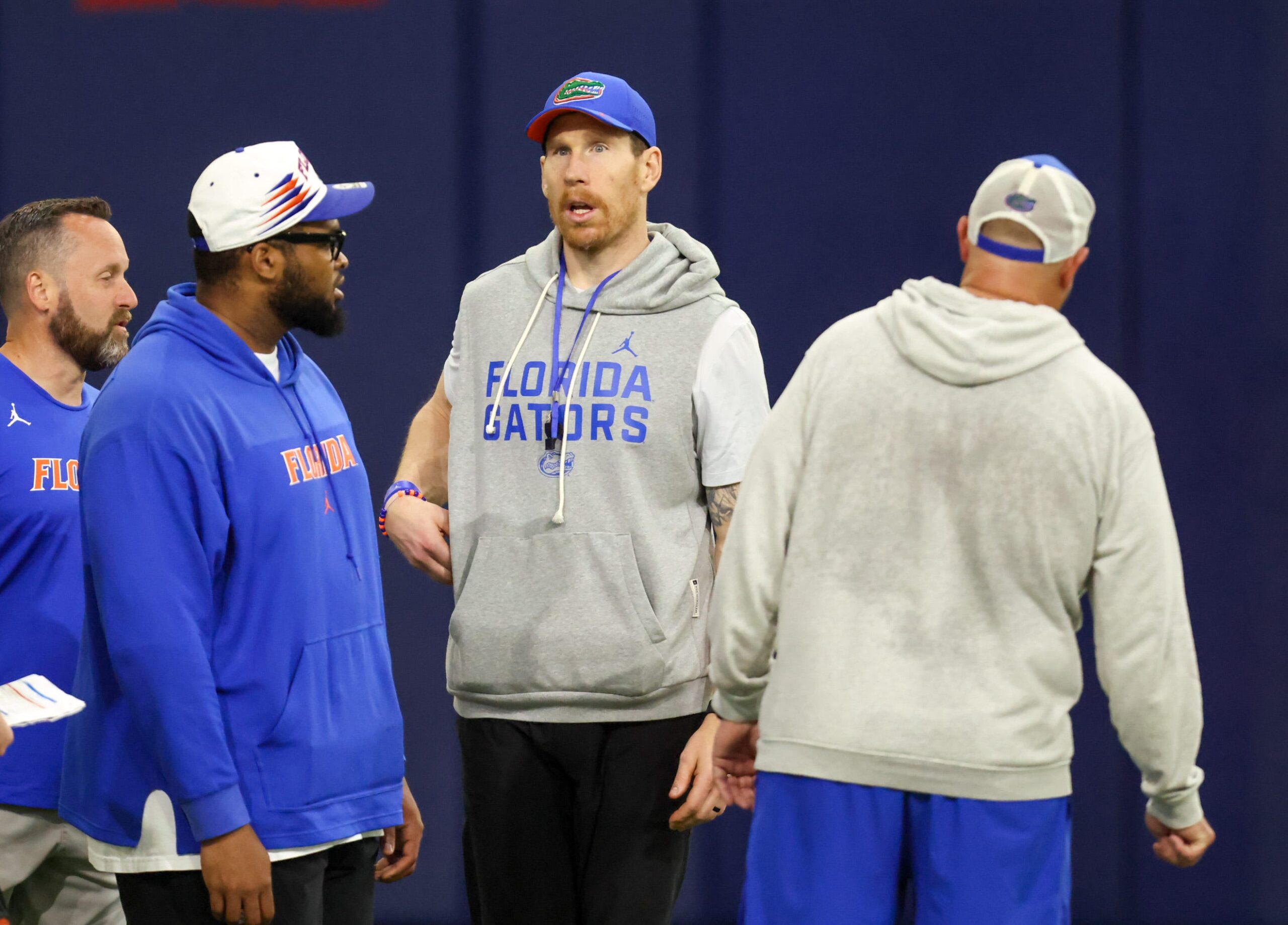 Florida offensive line coach Phil Trautwein, center, is shown during spring practice at Sanders Practice Fields in Gainesville, FL on Thursday, March 12, 2026.