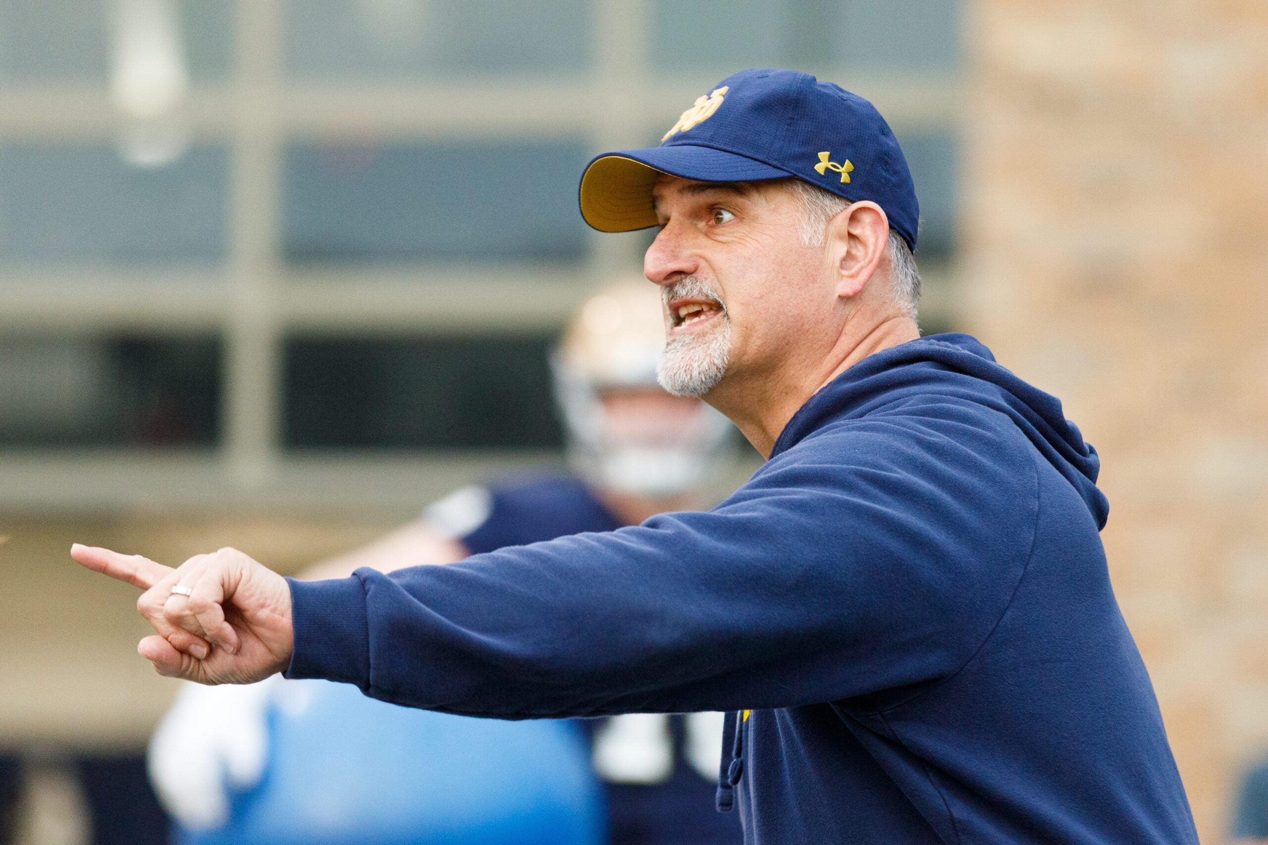 Offensive line coach Joe Rudolph runs a drill during a Notre Dame football practice at Irish Athletic Center on Friday, March 20, 2026, in South Bend.