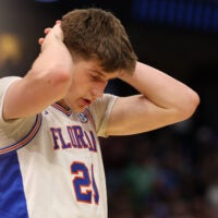 Mar 22, 2026; Tampa, FL, USA; Florida Gators forward Alex Condon (21) reacts after losing to the Iowa Hawkeyes in a second round game of the men's 2026 NCAA Tournament at Benchmark International Arena.