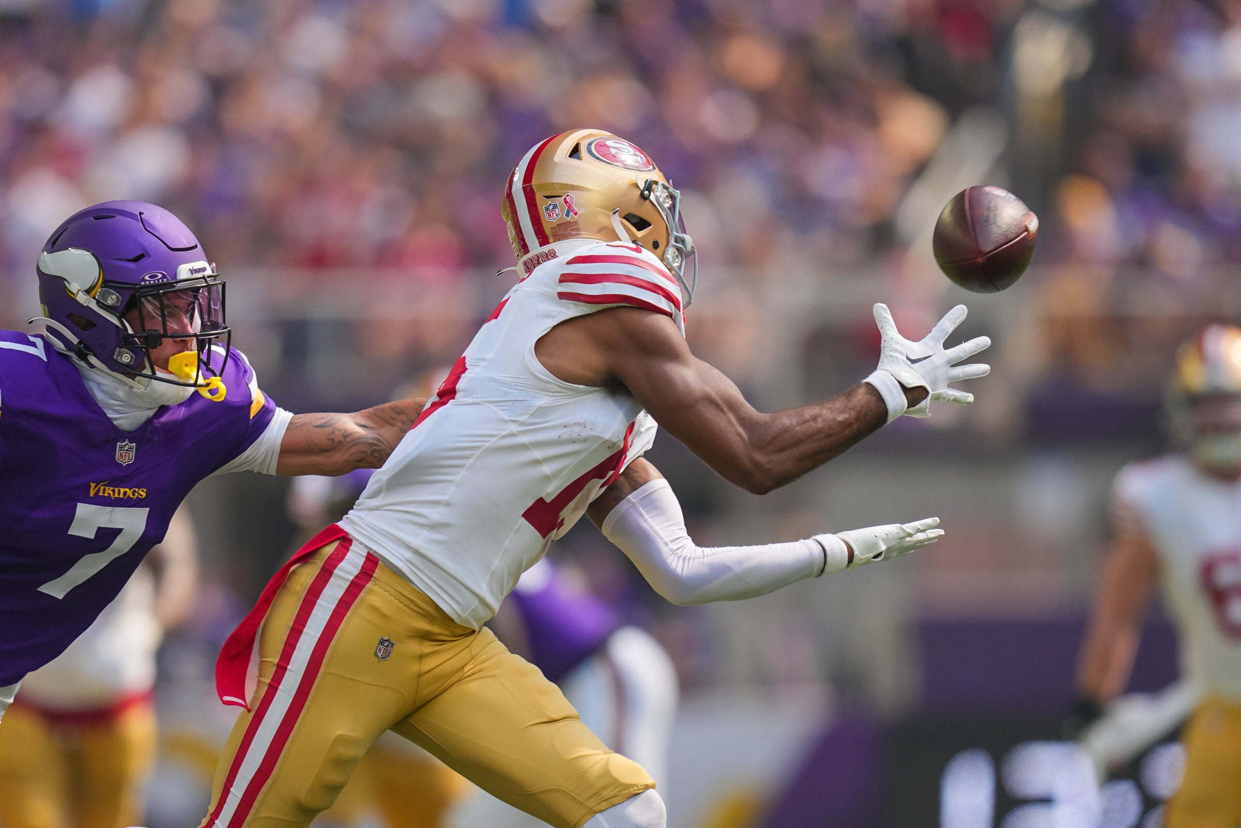 Sep 15, 2024; Minneapolis, Minnesota, USA; San Francisco 49ers wide receiver Jauan Jennings (15) catches the ball against the Minnesota Vikings in the second quarter at U.S. Bank Stadium.