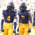 Sep 6, 2025; Berkeley, California, USA; California Golden Bears defensive backs Brent Austin (4) and Hezekiah Masses (5) react after a defensive play during the fourth quarter against the Texas Southern Tigers at California Memorial Stadium.