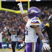 Sep 28, 2025; Dublin, Ireland; Minnesota Vikings running back Zavier Scott (36) reacts after catching a touchdown past during the fourth quarter against the Pittsburgh Steelers during an NFL International Series game at Croke Park.