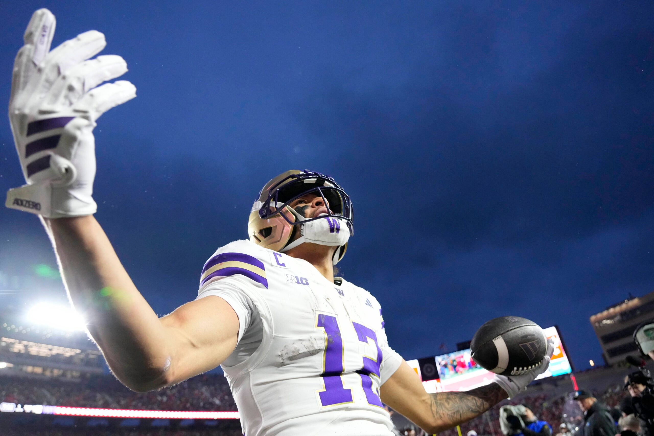 Nov 8, 2025; Madison, Wisconsin, USA; Washington Huskies wide receiver Denzel Boston (12) celebrates after scoring a touchdown during the second quarter against the Wisconsin Badgers at Camp Randall Stadium.