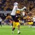 Nov 28, 2025; Tempe, Arizona, USA; Arizona Wildcats defensive back Treydan Stukes (2) intercepts the ball against Arizona State Sun Devils wide receiver Jaren Hamilton (16) in the second half during the 99th Territorial Cup at Mountain America Stadium.