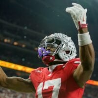 Ohio State Buckeyes wide receiver Carnell Tate (17) celebrates a touchdown Saturday, Dec. 6, 2025, during the Big Ten football championship against the Indiana Hoosiers at Lucas Oil Stadium in Indianapolis.