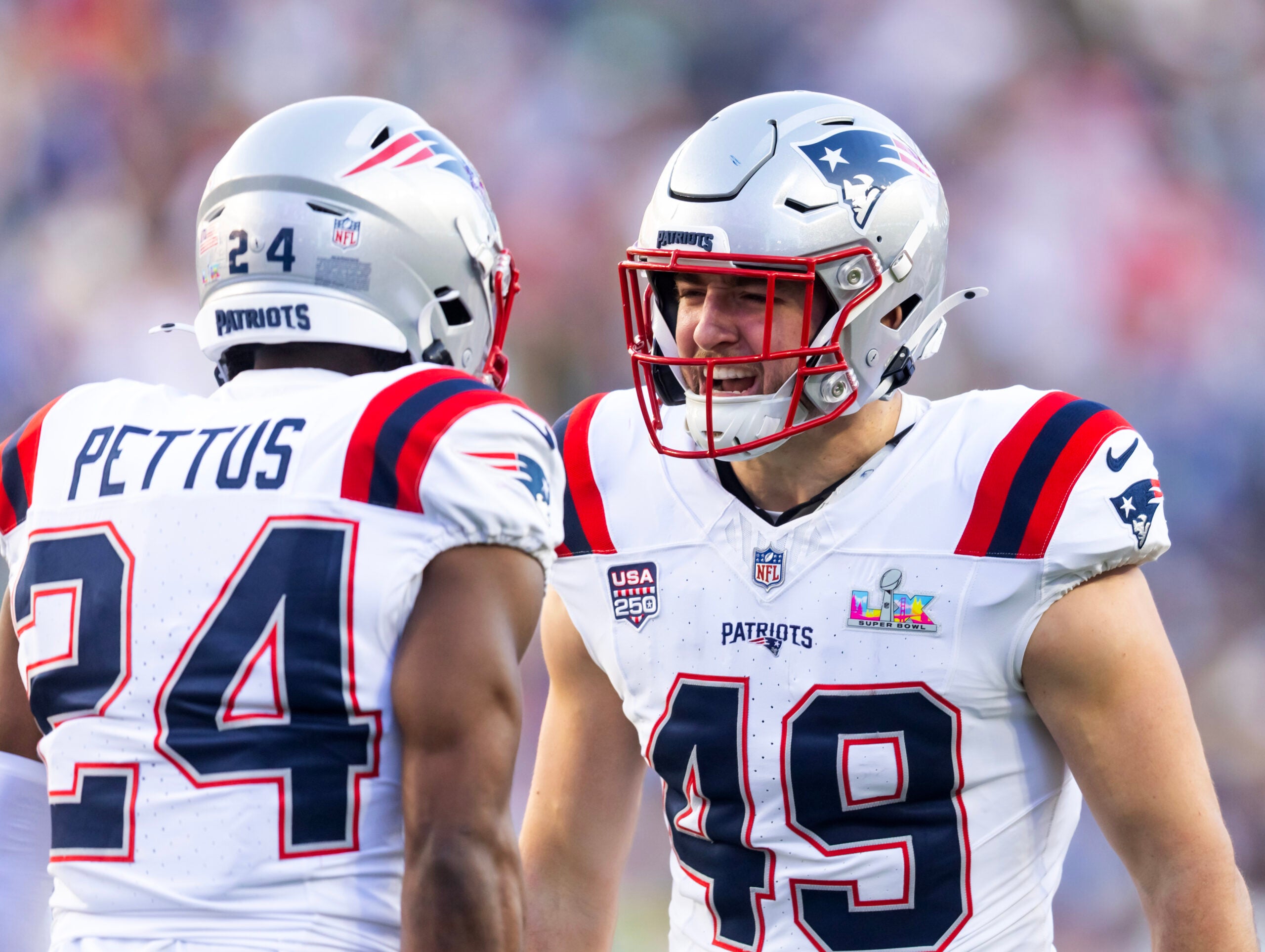 Feb 8, 2026; Santa Clara, CA, USA; New England Patriots safety Dell Pettus (24) and linebacker Chad Muma (49) celebrate after a play against the Seattle Seahawks during Super Bowl LX at Levi's Stadium.
