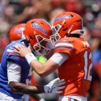 Florida wide receiver Micah Mays Jr. (5) and Florida quarterback Aaron Philo (12) celebrate during the second half of the Orange and Blue game at Steve Spurrier Field at Ben Hill Griffin Stadium in Gainesville, FL on Saturday, April 11, 2026. Alan Youngblood/Gainesville Sun