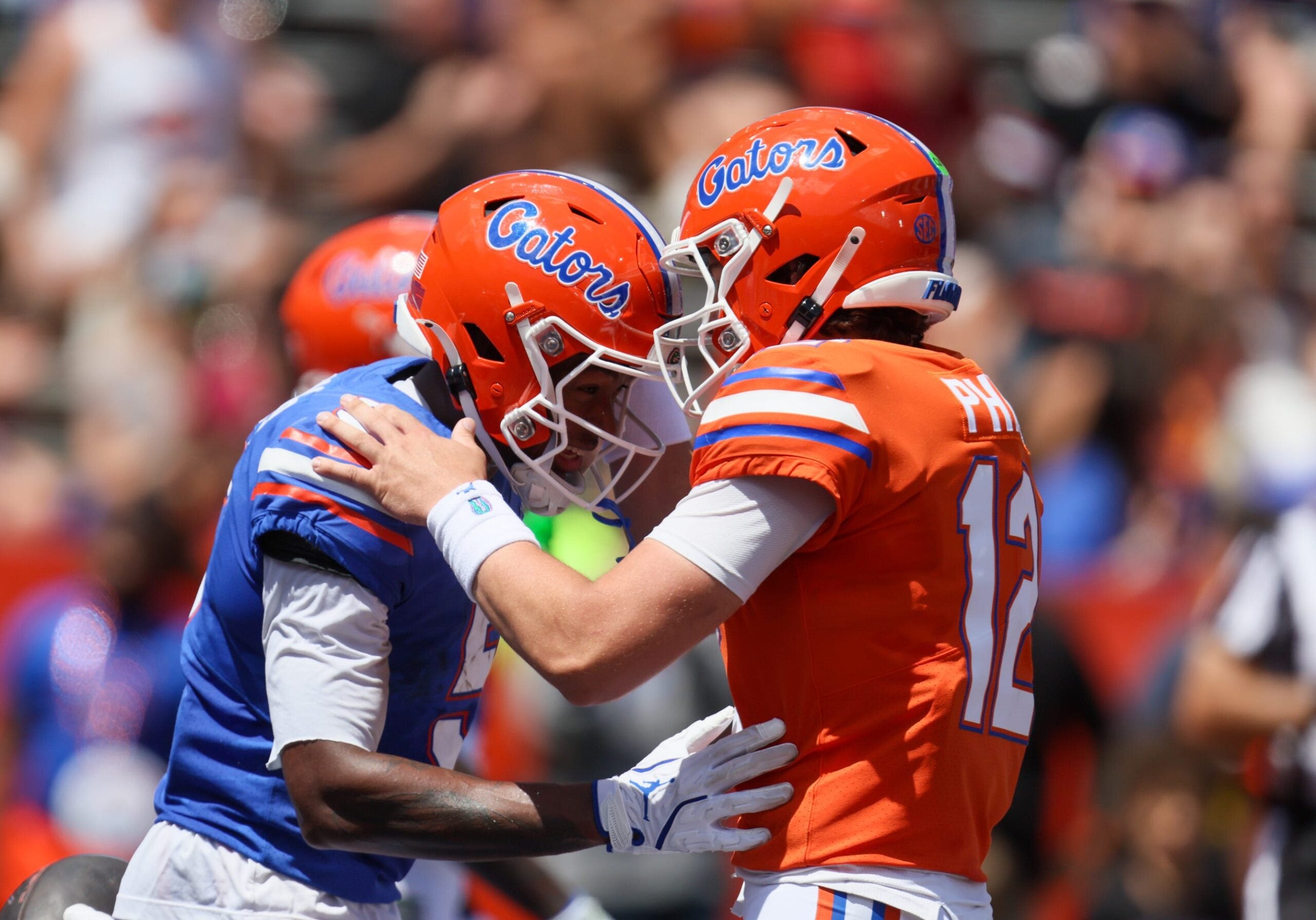 Florida wide receiver Micah Mays Jr. (5) and Florida quarterback Aaron Philo (12) celebrate during the second half of the Orange and Blue game at Steve Spurrier Field at Ben Hill Griffin Stadium in Gainesville, FL on Saturday, April 11, 2026. Alan Youngblood/Gainesville Sun