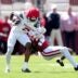 Oklahoma's Jahsiear Rogers (2) makes a catch as Reggie Powers III (3) tackles him during the University of Oklahoma Sooners Spring Game at the Gaylord Family - Oklahoma Memorial Stadium in Norman, Okla., Saturday April 18, 2026.