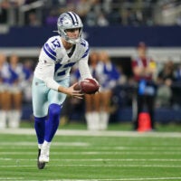 Dec 14, 2025; Arlington, Texas, USA; Dallas Cowboys place kicker Brandon Aubrey (17) runs a fake field goal during the first half against the Minnesota Vikings at AT&T Stadium.