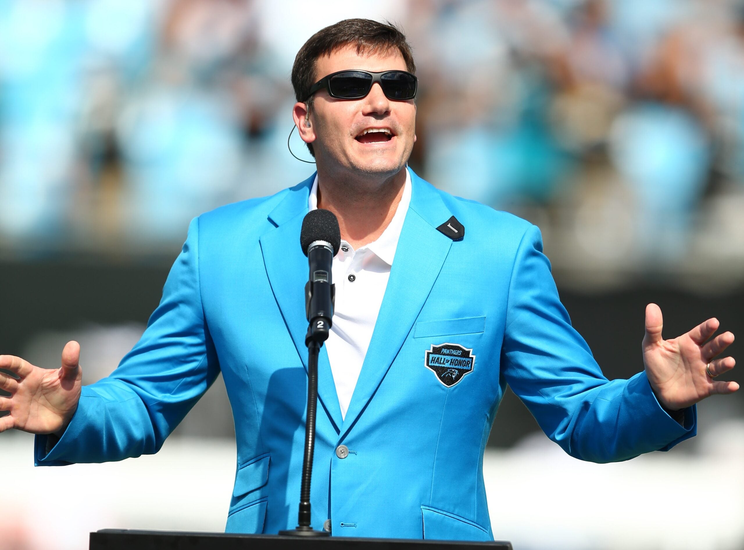 Oct 6, 2019; Charlotte, NC, USA; Carolina Panthers former quarterback Jake Delhomme speaks during the Hall of Honor ceremony during halftime against the Jacksonville Jaguars at Bank of America Stadium.