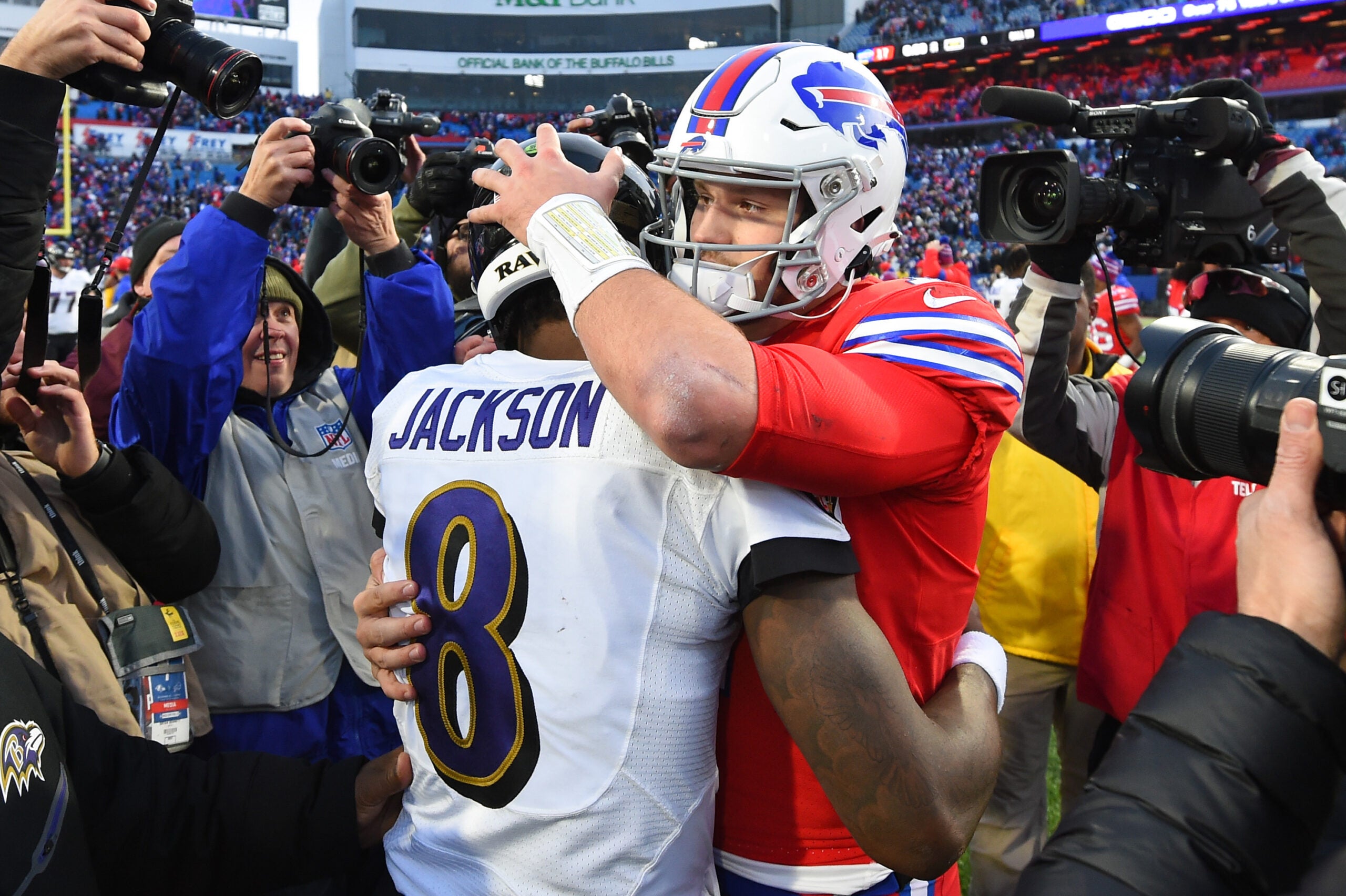 Dec 8, 2019; Orchard Park, NY, USA; Baltimore Ravens quarterback Lamar Jackson (8) and Buffalo Bills quarterback Josh Allen (17) embrace following the game at New Era Field.