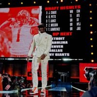 Apr 29, 2021; Cleveland, Ohio, USA; Ja'Marr Chase (LSU) walks on stage after being selected by Cincinnati Bengals as the number five overall pick in the first round of the 2021 NFL Draft at First Energy Stadium.