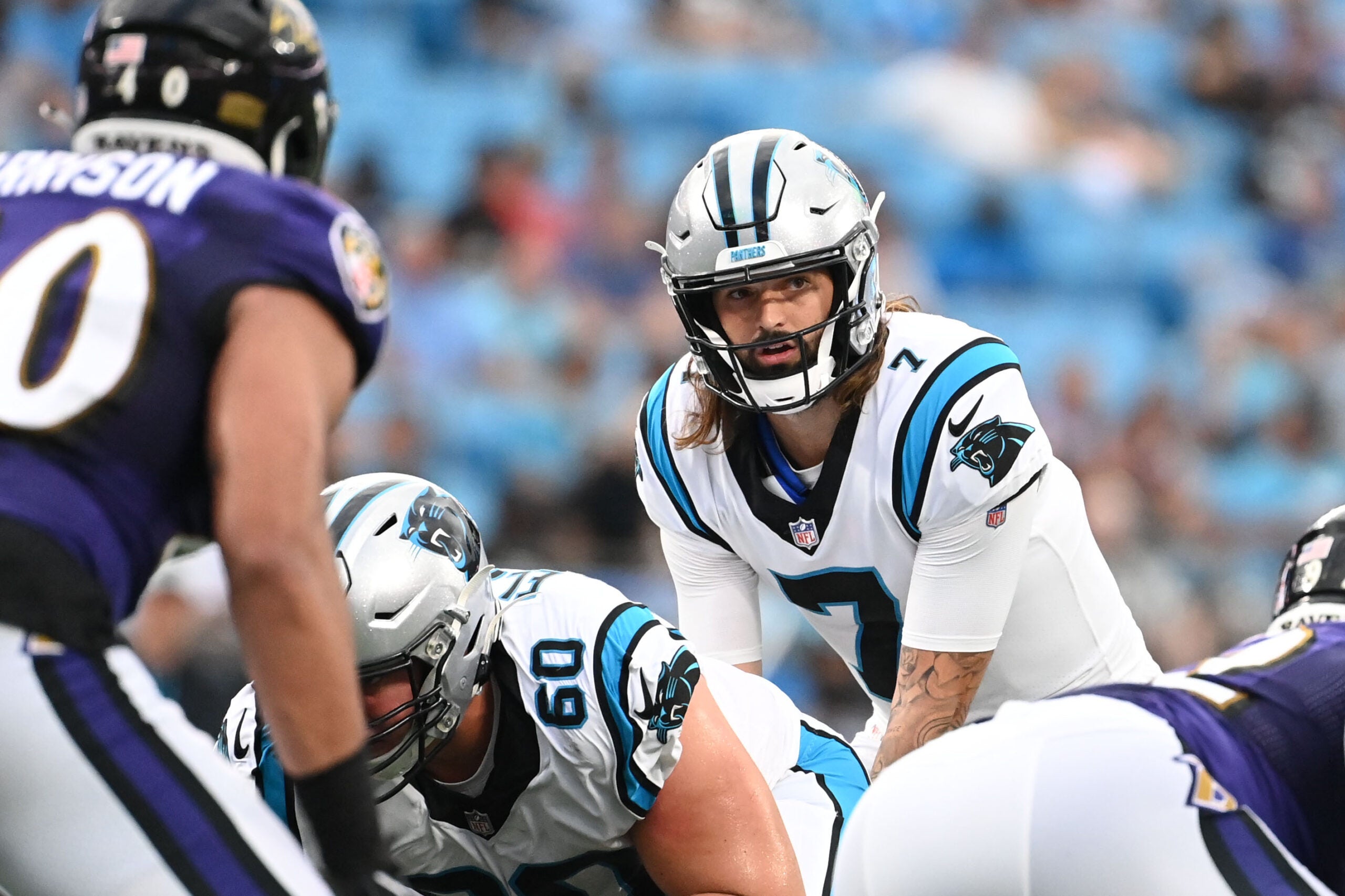 Aug 21, 2021; Charlotte, North Carolina, USA; Carolina Panthers quarterback Will Grier (7) at the line in the first quarter at Bank of America Stadium.
