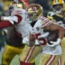 Jan 22, 2022; Green Bay, Wisconsin, USA; San Francisco 49ers running back Elijah Mitchell (25) in action against the Green Bay Packers during a NFC Divisional playoff football game at Lambeau Field.