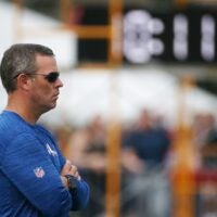 Bills General Manager Brandon Beane keeps watch on the action on the field on the second day of the Buffalo Bills training camp at St. John Fisher University in Rochester Monday, July 25, 2022.