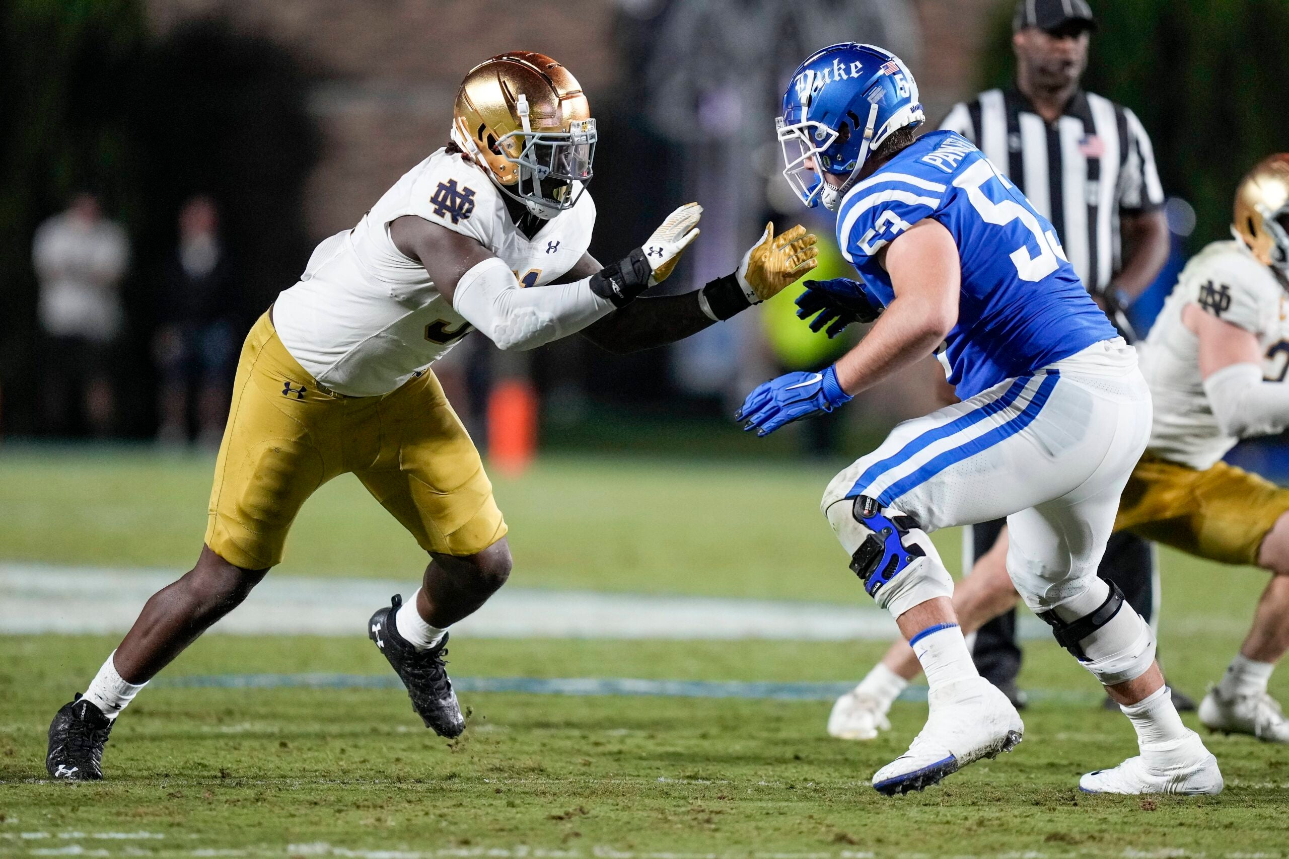 Sep 30, 2023; Durham, North Carolina, USA; Notre Dame Fighting Irish defensive lineman Nana Osafo-Mensah (31) against Duke Blue Devils offensive lineman Brian Parker II (53) during the second half at Wallace Wade Stadium.